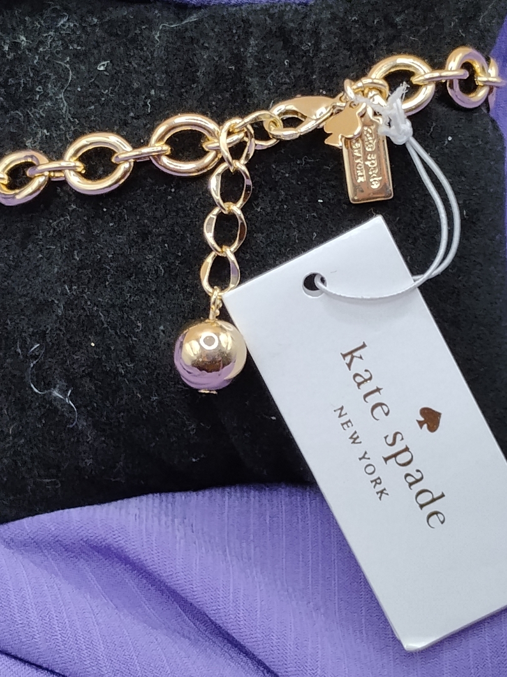 Kate Spade, 12 kt. Gold Plated Charm Chain Bracelet with Polished Ball and Tag